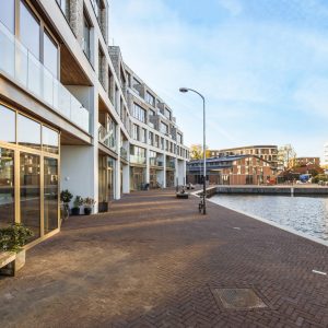 modern-apartment-building-2023-11-27-05-19-05-utc